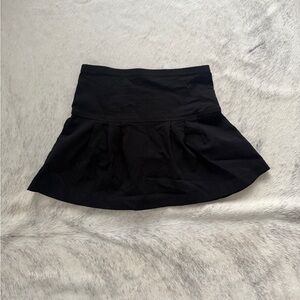 Black mini tennis skirt